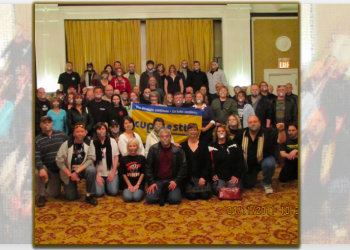 Postal workers participate in protest against axing NB Advisory Council on the Status of Women