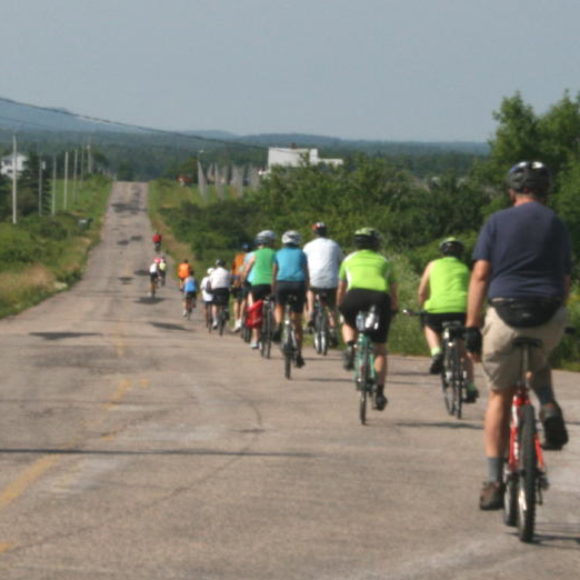 Bicycle festival participants travelling through Corn Hill on Saturday, July 23, 2011. Photo: Joanna Brown. cornhill-2011-3