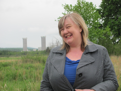 Beth Nixon, spokesperson for the Concerned Citizens of Penobsquis, speaking about the impacts of potash mining and gas exploration and production on her community during a tour of Penobsquis with supporters from Mining Watch Canada and CCNB Action on May 30, 2012. Photo: Tracy Glynn. bethnixon